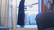 hd veiled muslim dancing on the balcony in front of a crane operator best